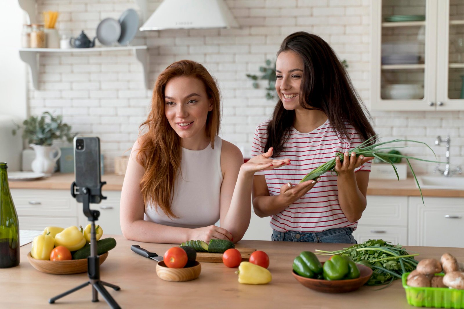 women-making-vlog-while-preparing-food